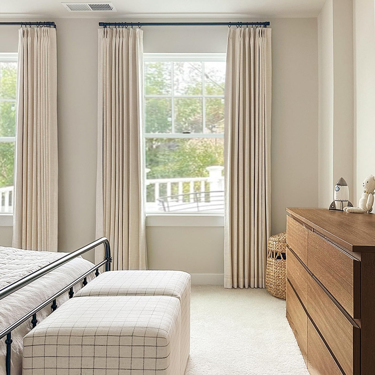 100% Blackout Shield cream curtains allowing subdued light for a relaxed home theatre