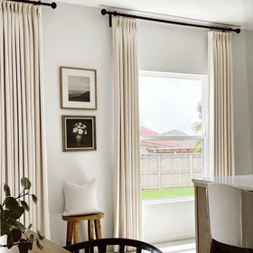 100% Blackout Shield cream blackout curtains with pinch pleats reduce outside noise