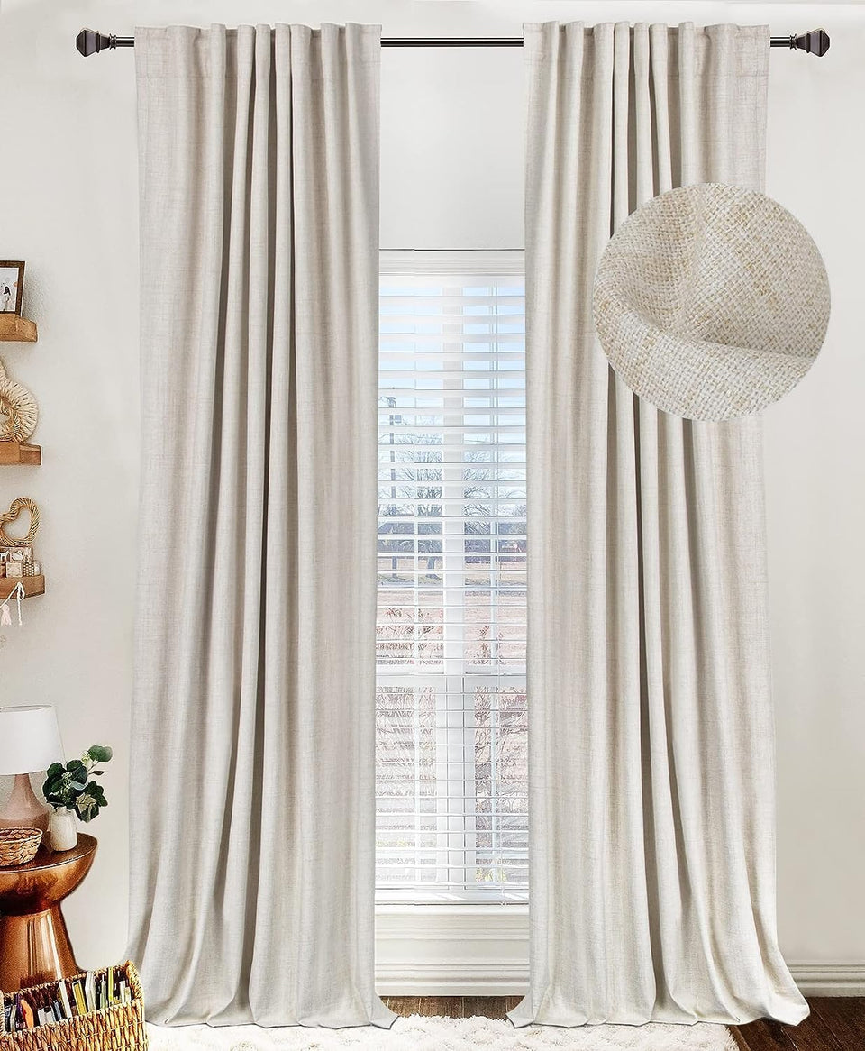 100% Blackout Shield cream curtain with linen texture and back-tab detail for privacy.