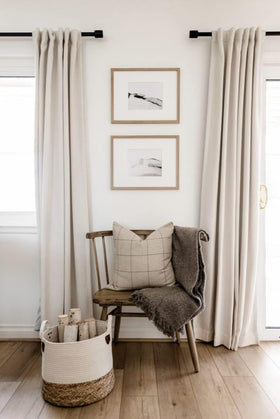 Textured linen look of 100% Blackout Shield curtains enhances cozy interiors.