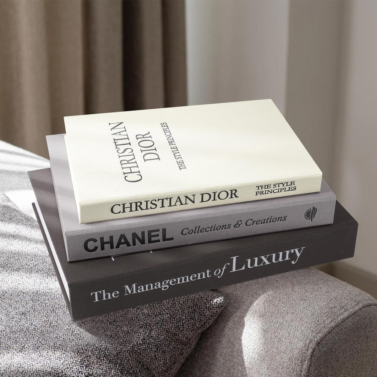 1DOT2 decorative books in gray linen displayed on a shelf adds calm sophistication