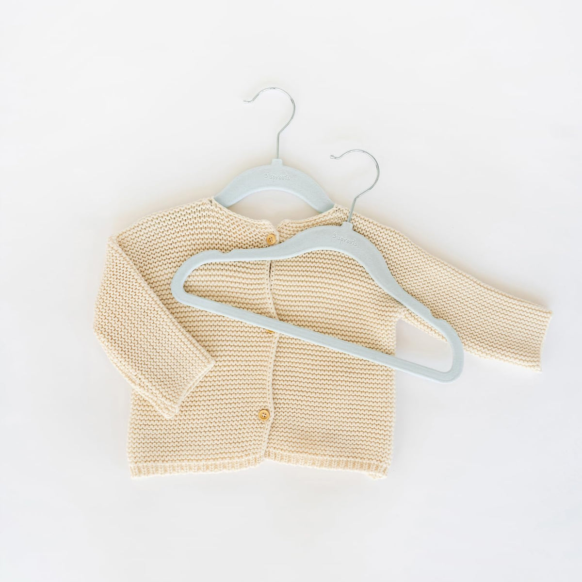 11.75 inch width of 3 Sprouts hangers supports various baby garments.