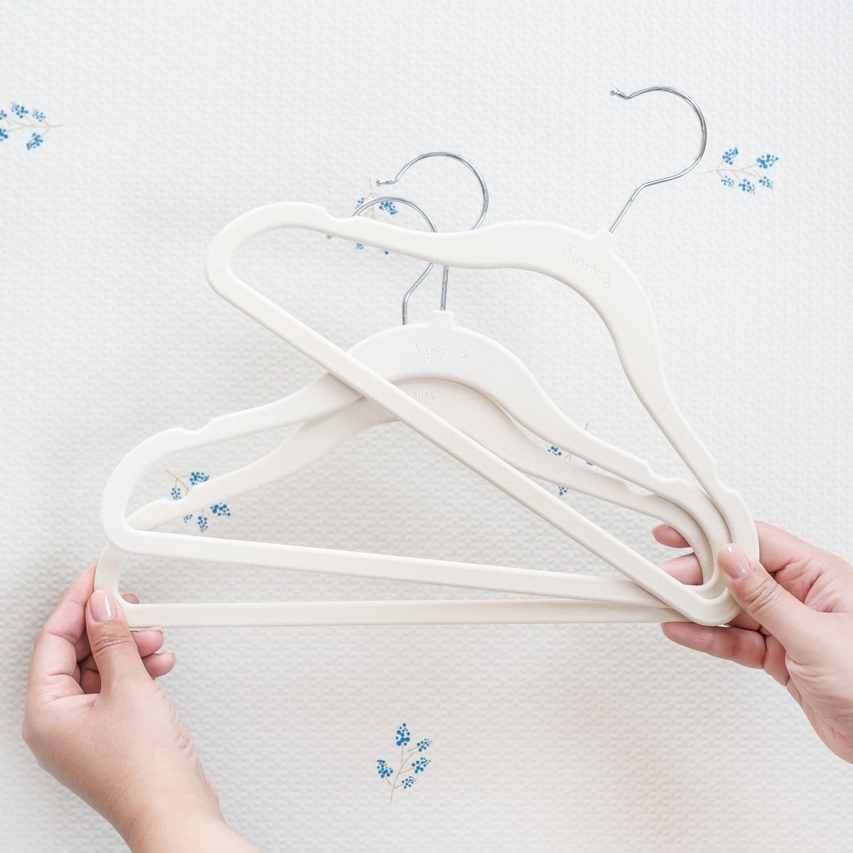 3 Sprouts Velvet Baby Hangers come in a 30-pack for growing wardrobes