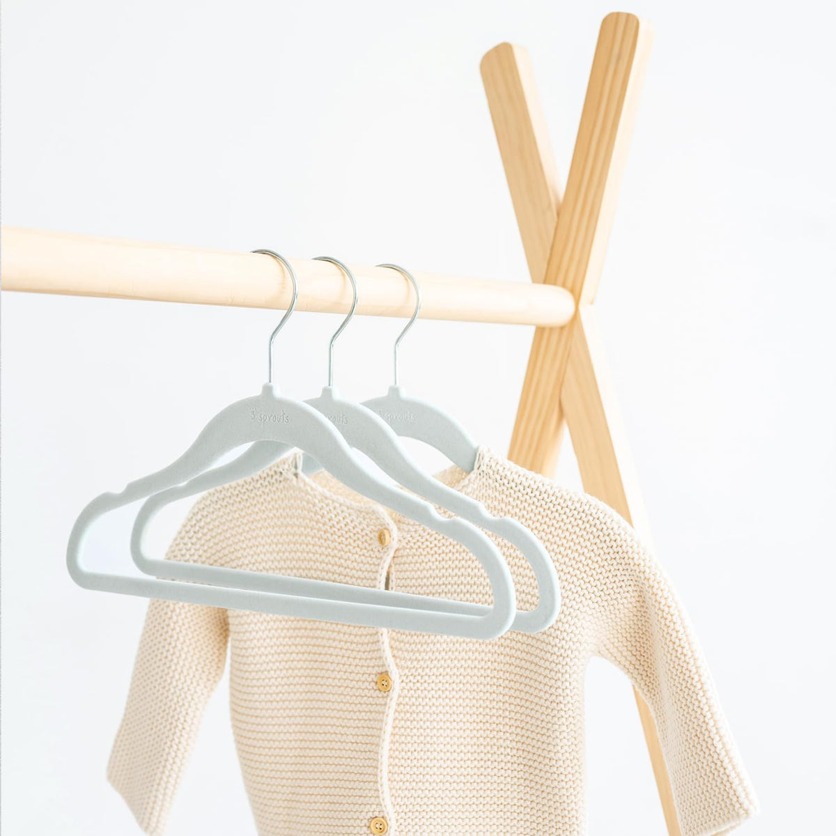 Hangers suitable for newborn to toddler clothes from 3 Sprouts Velvet line.
