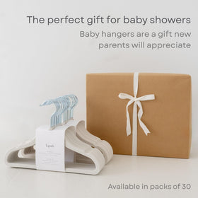 Nordic blue color palette of 3 Sprouts hangers complements modern nursery decor.