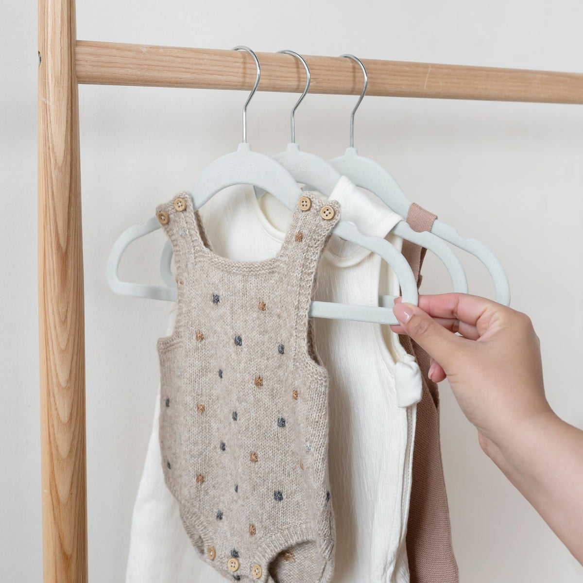 Slim 0.25 inch profile of 3 Sprouts velvet hangers saves closet space.