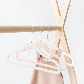 Slim-profile hangers maximize closet space for growing wardrobes