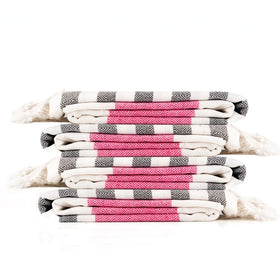 9Threads Rosé Obsidian towel highlights sand-free weave for clean beach days.