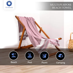 9Threads towel draped on lounge chair showcasing oversized coverage.