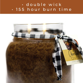 Farmhouse decor scene with Praline Caramel Sticky Buns candle, perfect for seasonal tables.