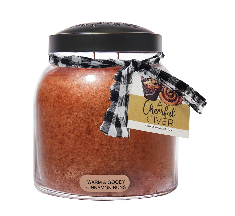 A Cheerful Giver warm gooey cinnamon buns papa candle jar aroma in cozy space