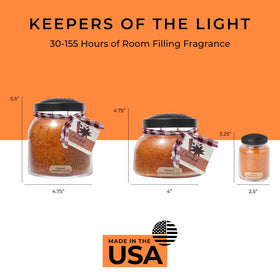 A Cheerful Giver orange scented candle fills spaces with comforting citrus warmth.