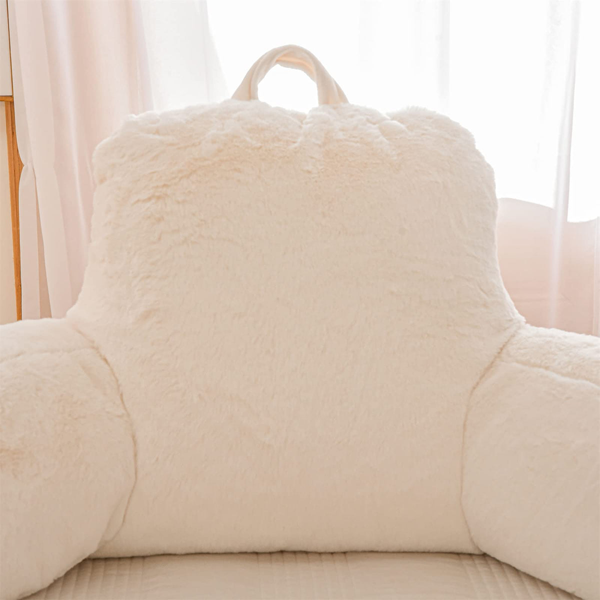A Nice Night back rest with arms provides shoulder and neck relief while watching TV