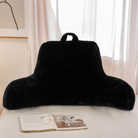 A Nice Night backrest with arms demonstrates supportive posture while in bed