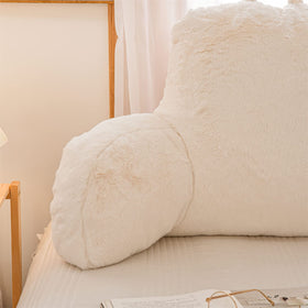 A Nice Night ivory faux fur cushion sits stylishly, adding comfort to any seating area