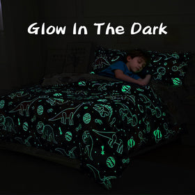 A Nice Night kids bedroom with dinosaur print adding color to sleep space