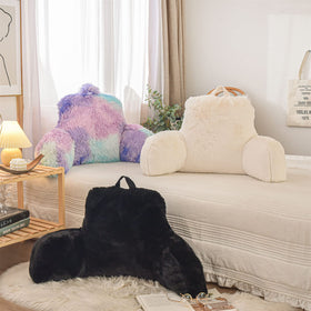 A Nice Night portable reading pillow with carry handle for easy transport.