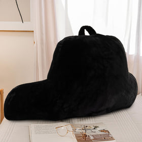 A Nice Night reading pillow on sofa for relaxed reading.