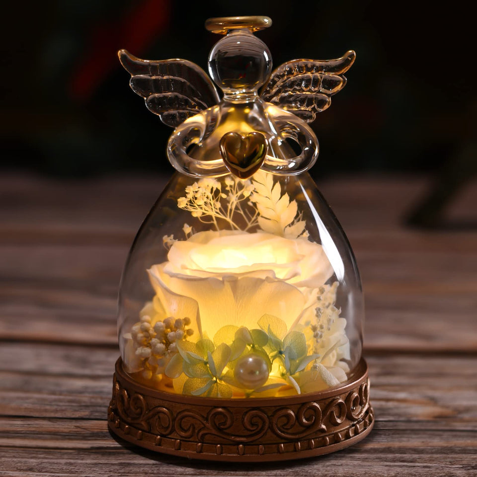 Aastin preserved rose in a glass angel figurine for a lasting keepsake display.