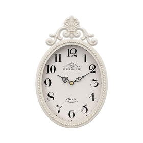 Abdurey small French retro wall clock in ivory oval adds timeless elegance to any room.