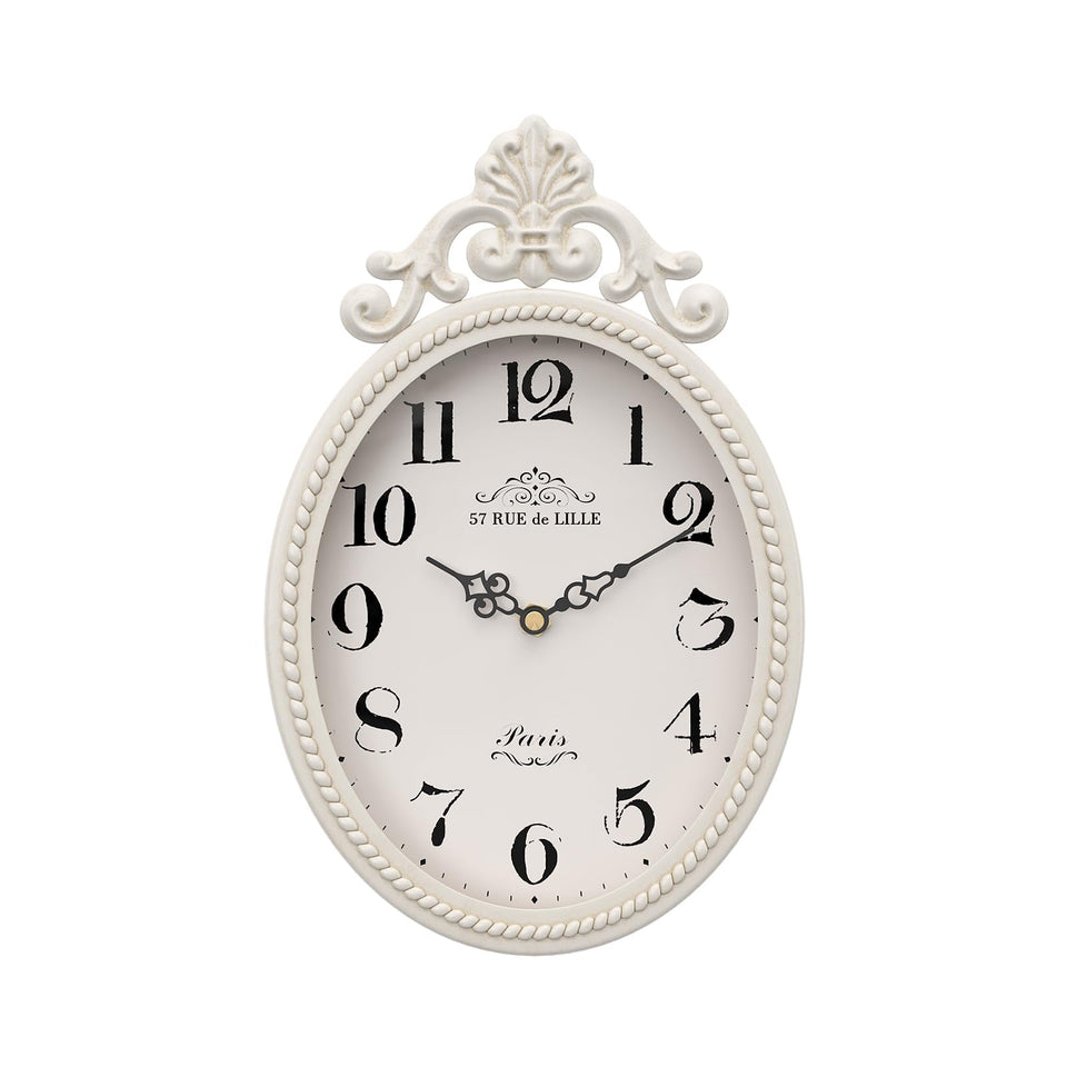Abdurey small French retro wall clock in ivory oval adds timeless elegance to any room.
