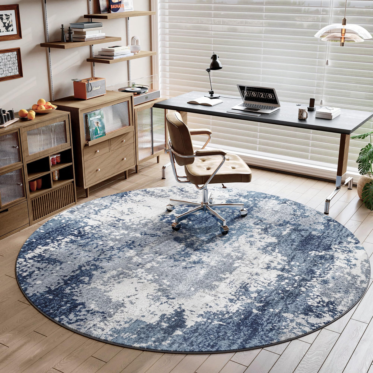 Acapet blue round rug anti-slip back keeps it in place on smooth floors.