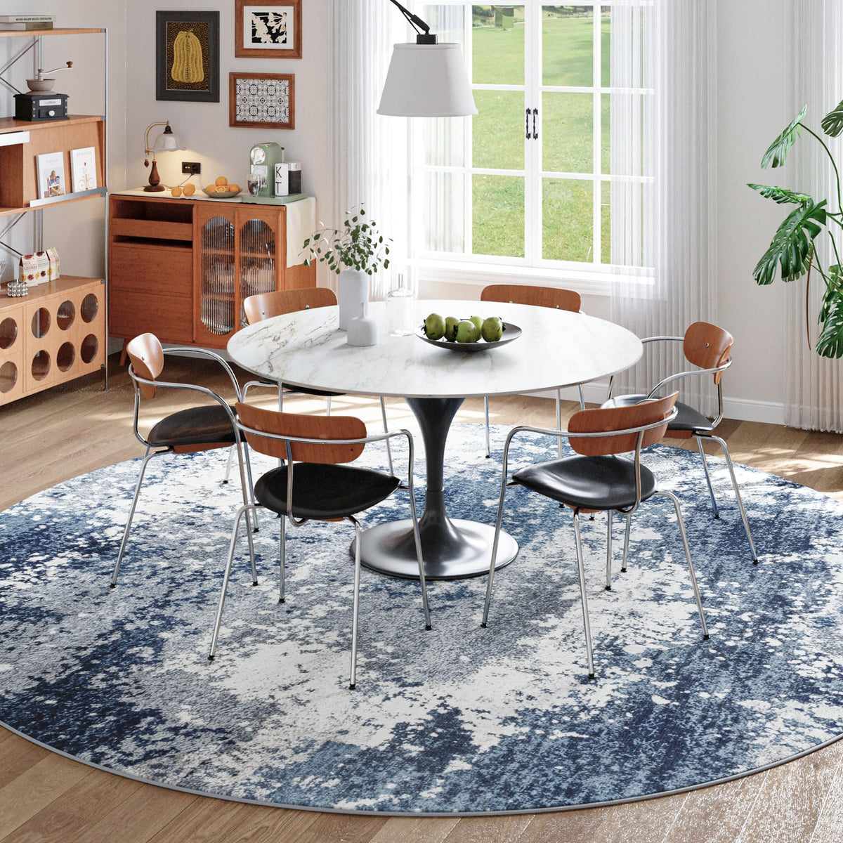 Acapet blue round rug under dining table fits small spaces beautifully.