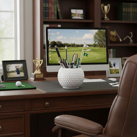 Accents & Occasions ceramic golf ball planter outdoors on patio enhances entryway.