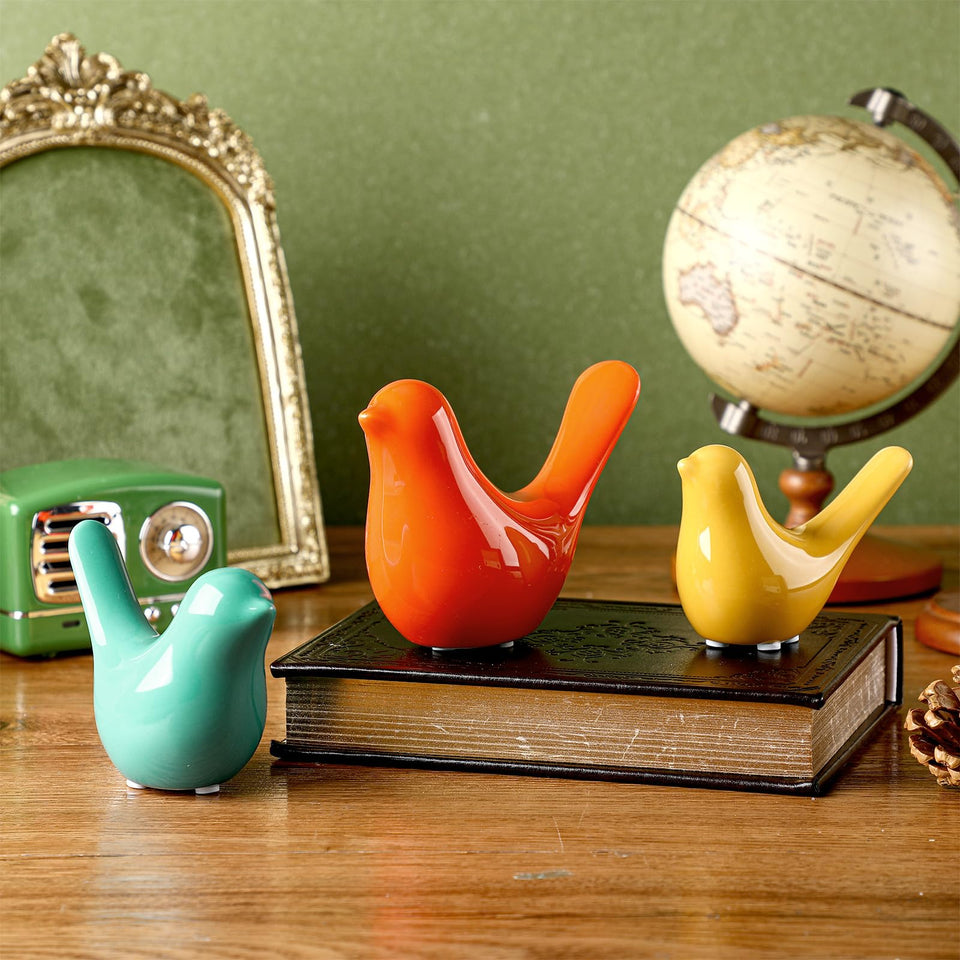 AceOrbit ceramic birds in orange, blue, and yellow brighten desks and shelves.