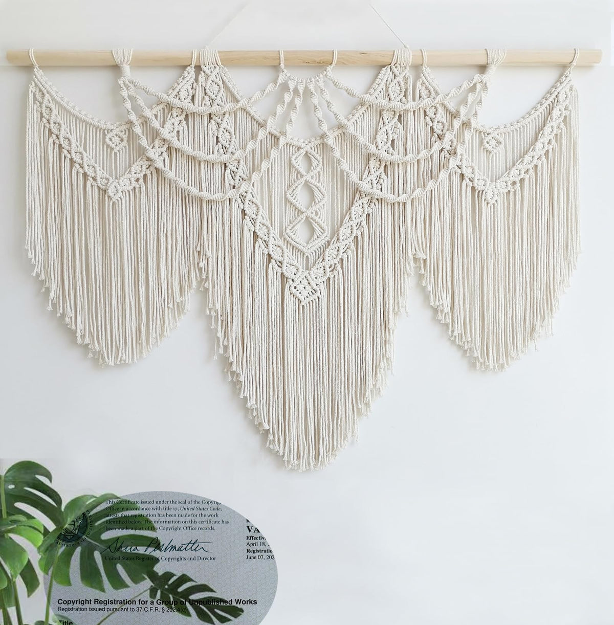 Achart macrame wall hanging in living room setting shows stylish decor.