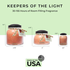 Warm candle glow adds ambience to living room settings.