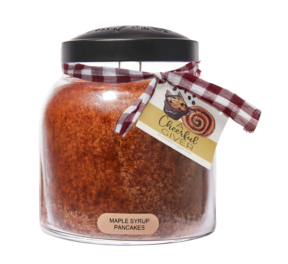 A Cheerful Giver maple syrup pancakes candle jar glows warmly for cozy evenings.