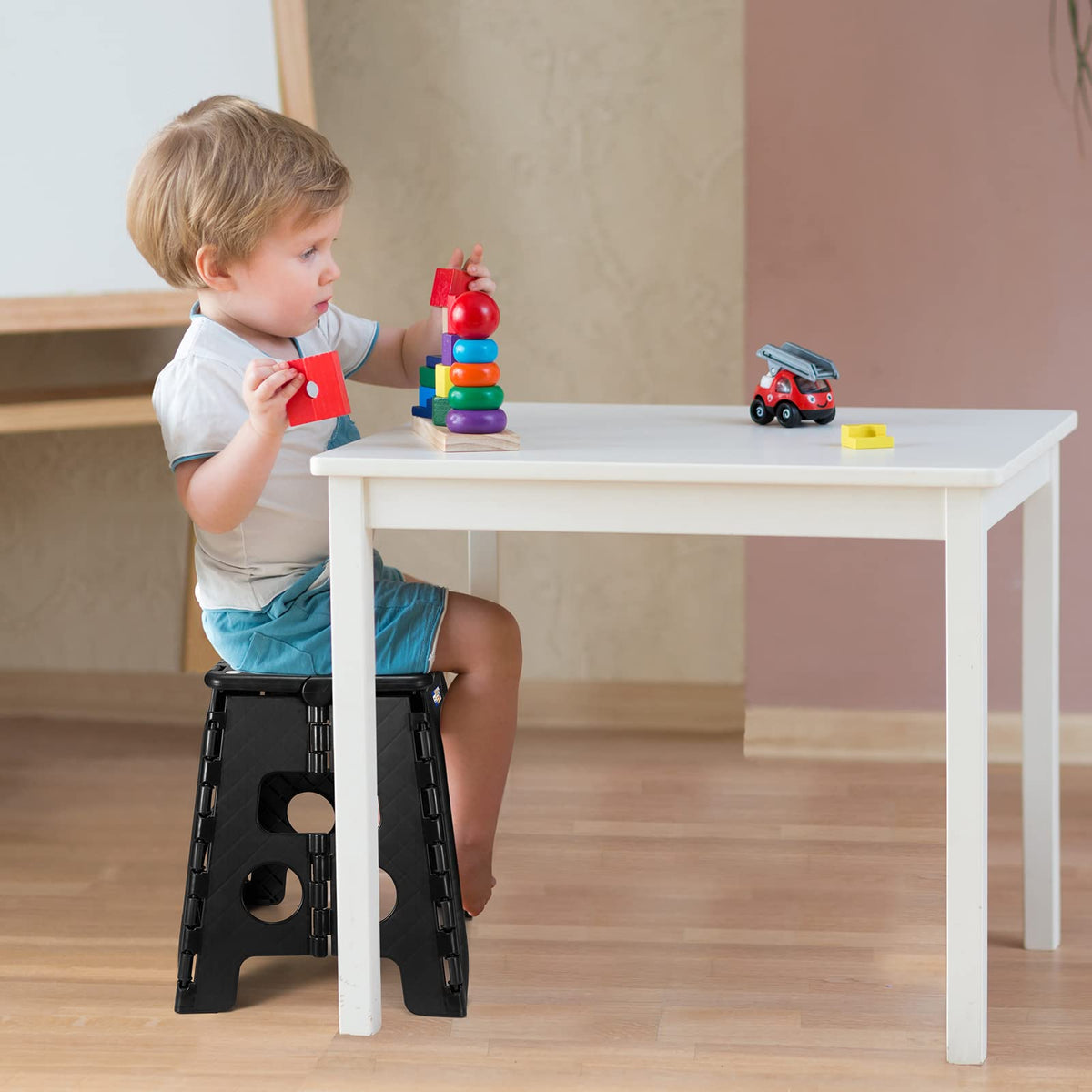 ACKO 2PACK folding stool in bathroom use for grooming tasks.