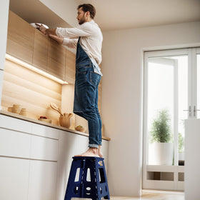 ACKO folding step stool portable lightweight for indoors and outdoors.