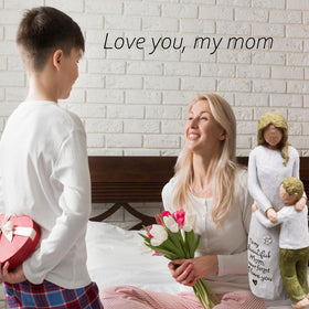 AcowSpt son leaning on mother figurine offers a heartfelt keepsake gift.