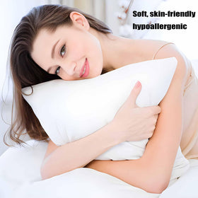 Acteb two-pack packaging highlights hypoallergenic down-alternative fill.