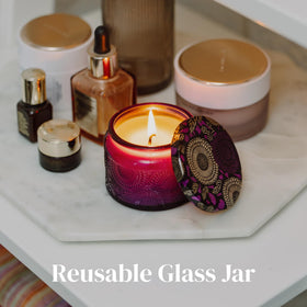 ADELEGOURDAIN Reusable glass candle jar complements decor and storage.