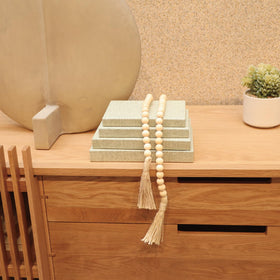 ADUN Stationery decorative books on the fireplace mantel elevate cozy ambiance.