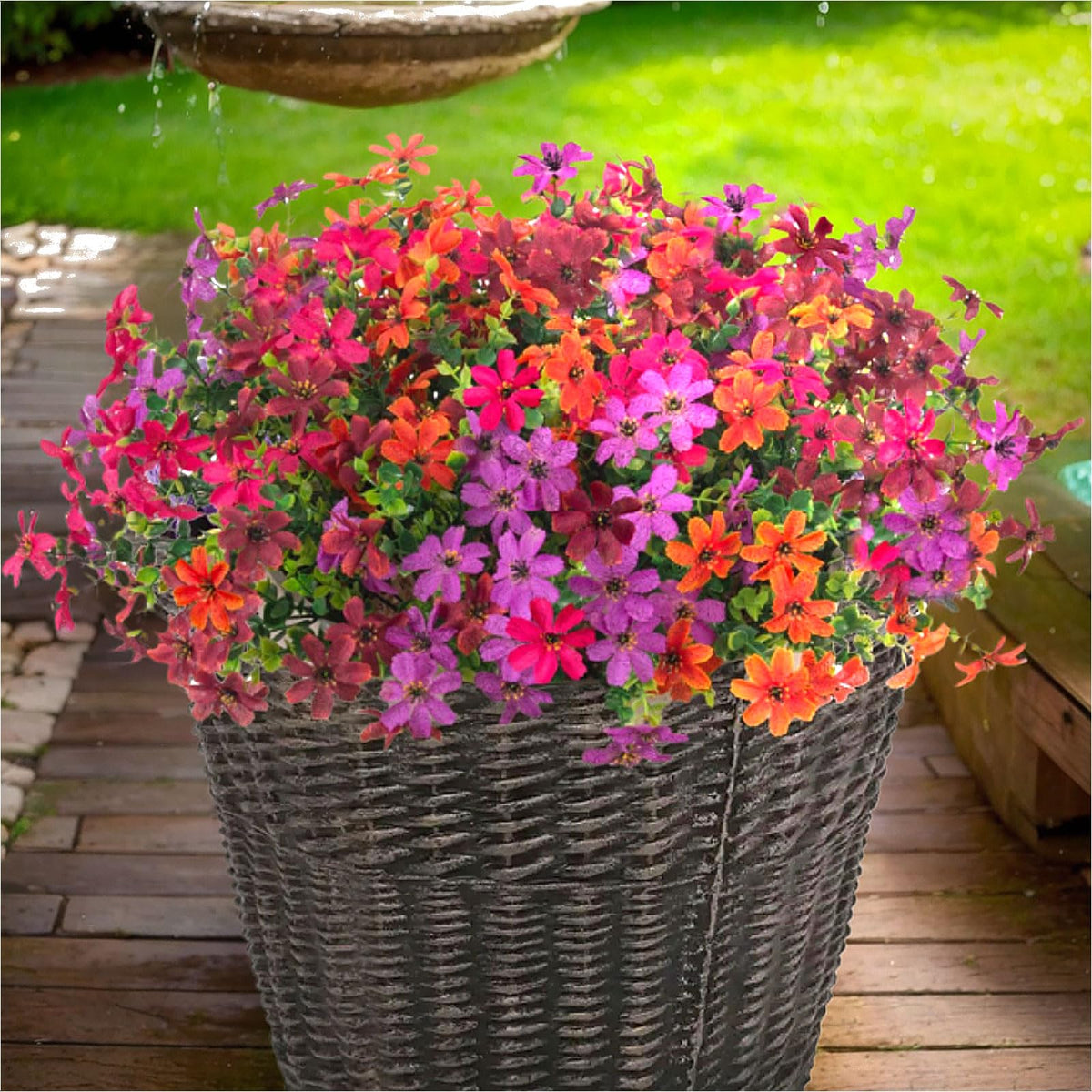 ADXORA 12-piece daisy flower set displayed in a garden showcase