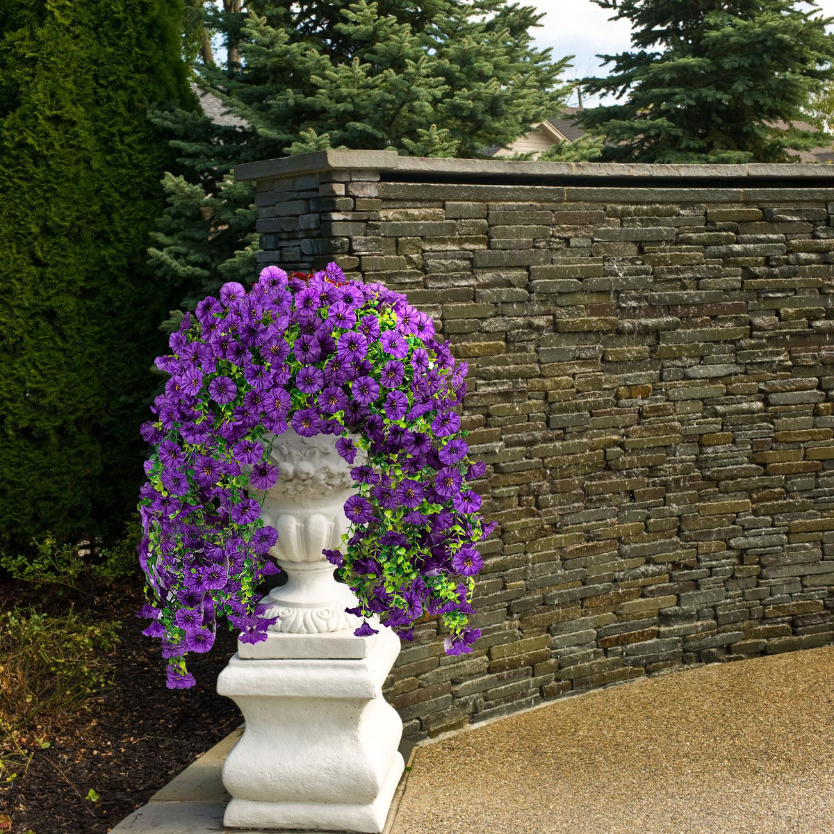 ADXORA outdoor-safe silk flowers that resist watering and sun.