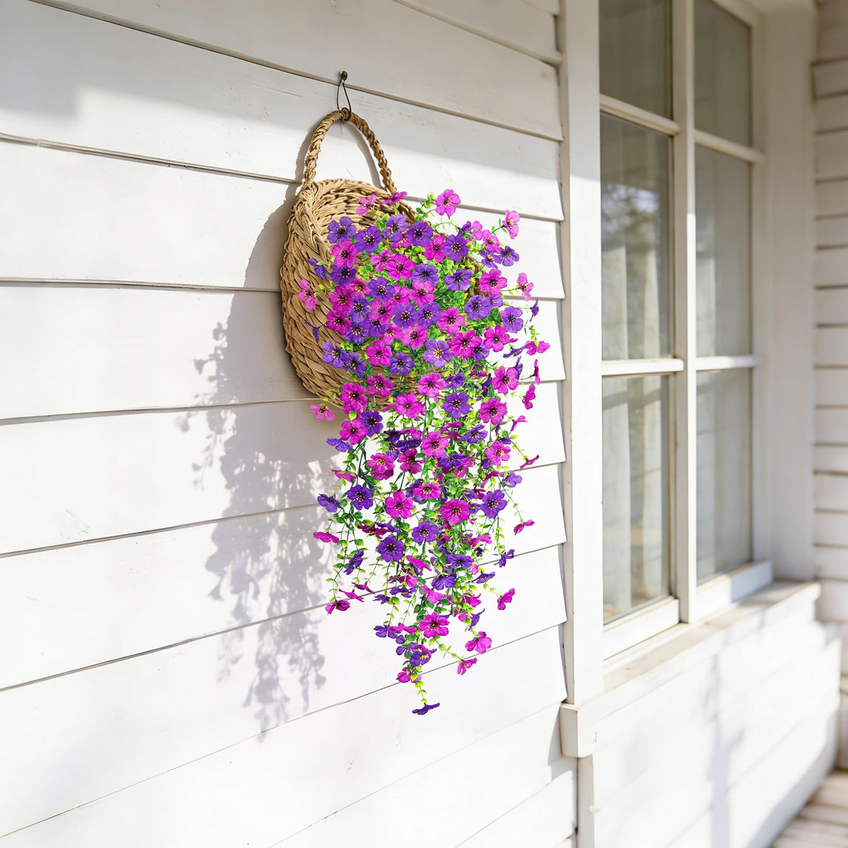 ADXORA outdoor hanging flowers enhancing window box displays.