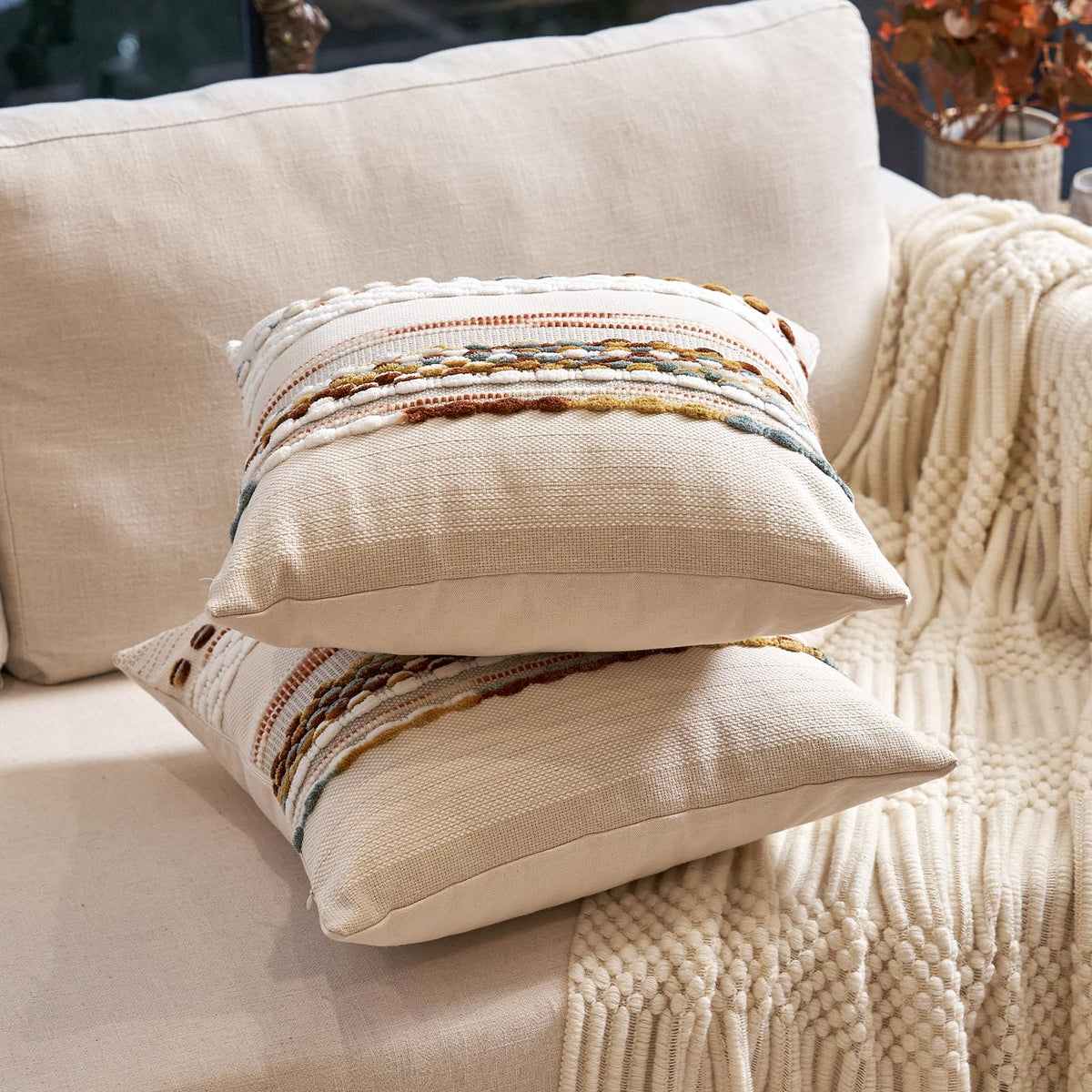 Aeckself decorative pillow covers create a lived-in look on living rooms and couches.