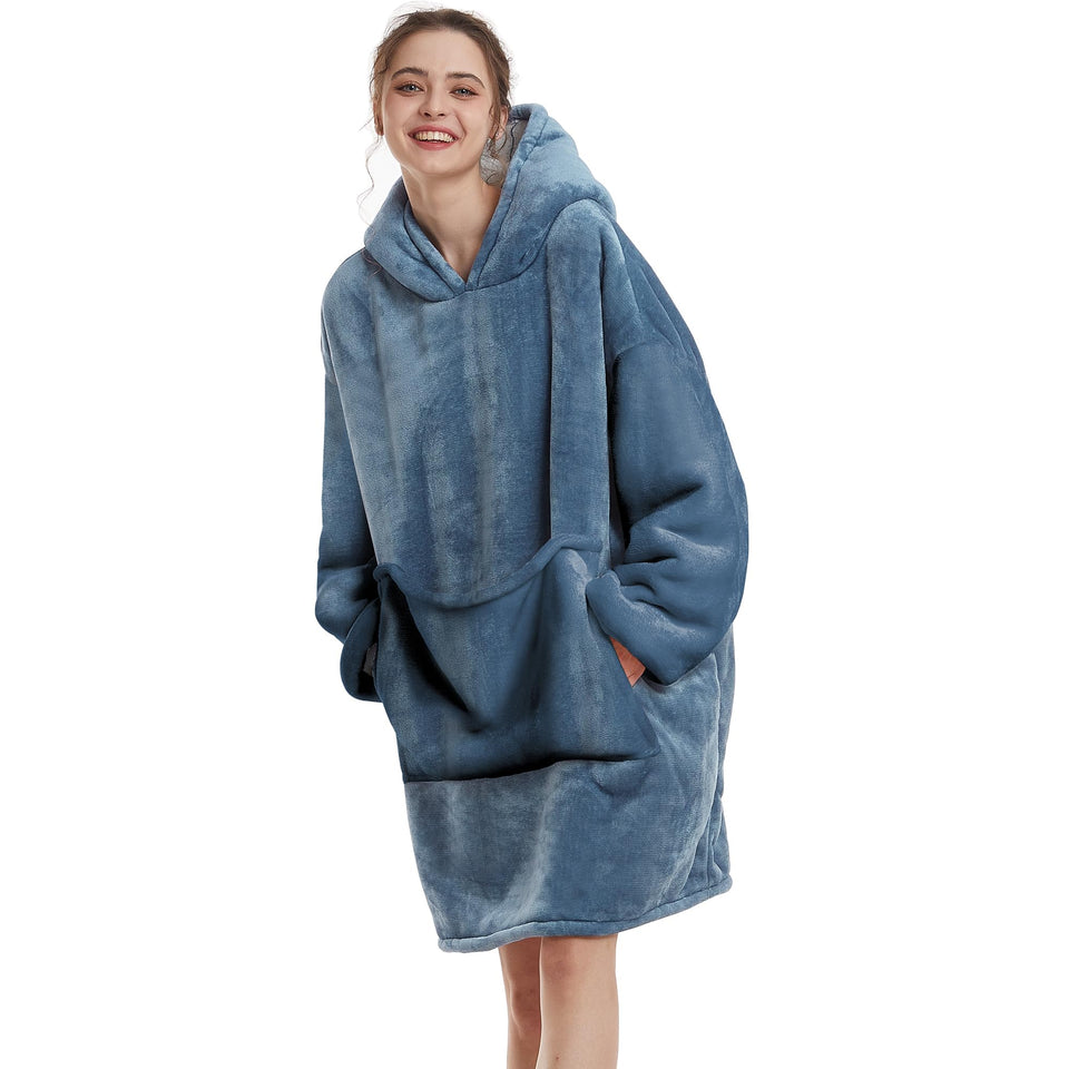 Aemilas wearable blanket hoodie in greyish blue front view, cozy oversized fit.