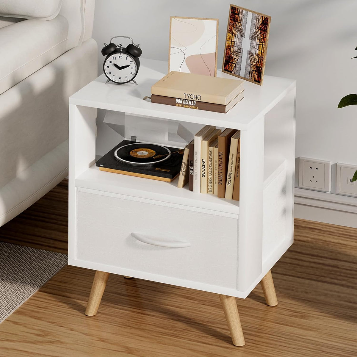 Aenuert night stand with white drawer for organized bedside storage.