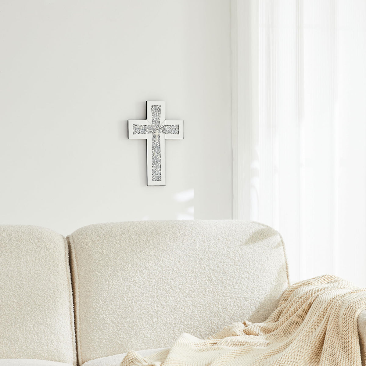 Aeveco easy install cross mirror helps refresh walls quickly.