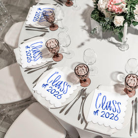 Affrolling blue-printed Class of 2026 napkins for celebrations