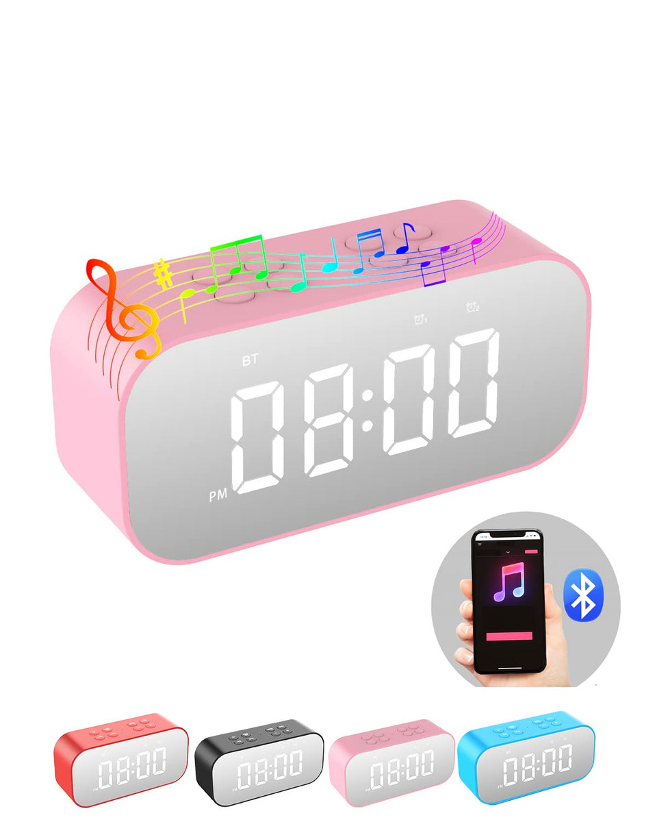 AFK alarm clock with Bluetooth speaker on bedside table for clear audio and gentle wake-ups.