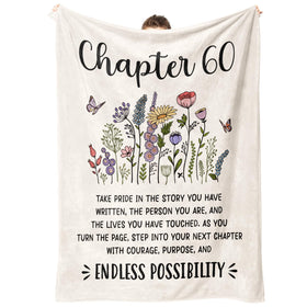 Afterprints Chapter 60 blanket with flowers and butterflies for milestone celebration and cozy comfort.