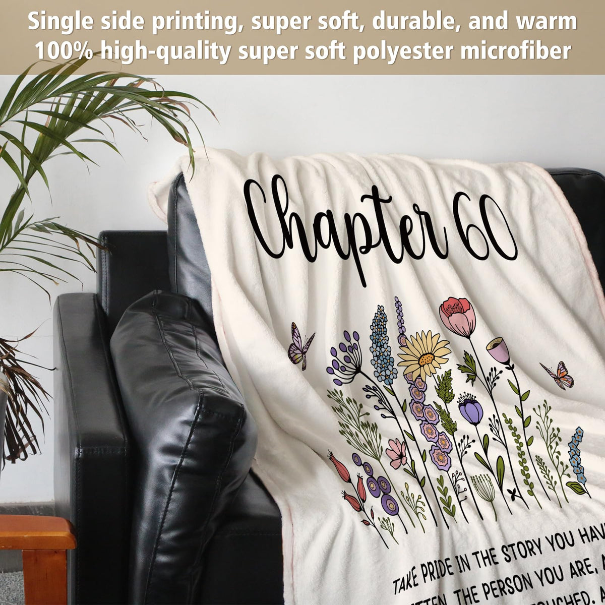 Afterprints cozy throw displayed on a sofa, adding style and inviting warmth.