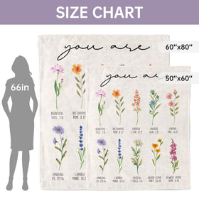 Afterprints blanket features flowers and scripture print for daily inspiration.